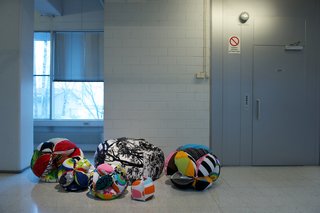 These Global Hassocks by Marimekko designer Tuula Pöyhönen brighten a hallway of the Marimekko factory. Instructions on how to make these yourself can be found in Marimekko's new book Surrur, a project book featuring fabric crafts and ideas from seven Marimekko designers.