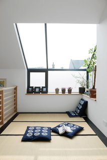 The tatami room (pictured) has mats from the Futon Company and a "Hinamatsuri" mobile adds a cheery touch.
