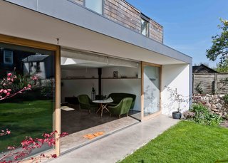 The nuri-en (an exterior overhang) is one of the few Japanese touches on the home's exterior. Paired with the continuation of the interior floor right out into the backyard, the home opens up to the outside quite nicely.