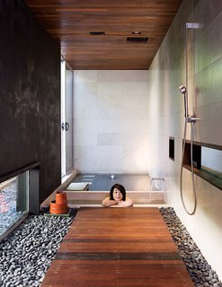 Japanese Soaking Tubs - Photo 11 of 13 - At the opposite end of the house, the soaking tub gets almost daily use. The bath and shower fixtures are by Dornbracht
