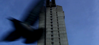 Science Fiction Architecture - Photo 4 of 7 - A bird passes by the iconic building.