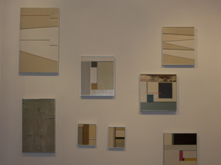 Alex Garcia Exhibit - Photo 7 of 7 - Additional works on view, ranging from $550 to $750. The smaller pieces are made with stained and painted wood covered with resin. Photo by Beat Exposure.