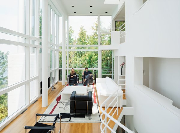 Michael McCarthy and Marcia Myers spent years rehabilitating the Douglas House. The double-height living room features a custom sofa and low table of Meier’s design, and an Edward Fields rug based on a sketch Le Corbusier created in 1956 for a Tokyo theater.