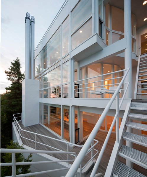 The rear facade is a complex articulation of angles and walkways.