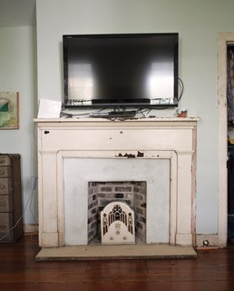 One of six fireplaces in the Rice and Nissenboim residence. The pair have plan to rehabilitate all of them to working order eventually.