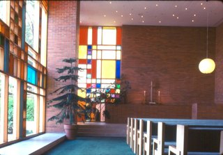 Blocks of color in the stained glass windows and decidedly more sober brick are the dominant materials of the main sanctuary of Midland's First Methodist Church.