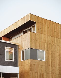 One view of the Finn Lofts' southwest corner includes a cut-out rain screen.