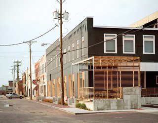 A wider look at the screened patio attached to the Finn Lofts.
