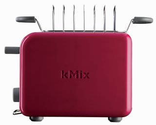 kMix by De'Longhi - Photo 3 of 9 - The toaster also features a stainless steel bun warmer and toast rack.