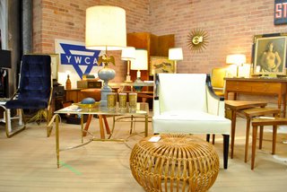 STUDY always brings a covetable collection to TVB. Co-owners John Tyler and Andrew Schultz moonlight as home stylists and Schultz recently launched his own styling business, Houndstooth Design & Vintage. The Albini ottoman in the foreground was snatched up minutes after the flea opened. <br><br>Photo by <br><br>John Tyler