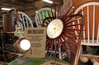 Smarty pants vendors Take 2 Vintage (Robin Witt and Joe Moore) had a contest going in their booth. They offered up this timeless mid-century clock to one lucky Facebook fan. <br><br>Photo by <br><br>Felix Jung
