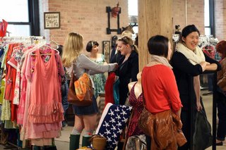Vintage clothing and accessories vendors are abundant at the Bazaar, like Nicole Hughes’ Bombshellshocked booth where gals congregated to pick from her retro threads and have a few laughs. <br><br>Photo by <br><br>Steven Pate