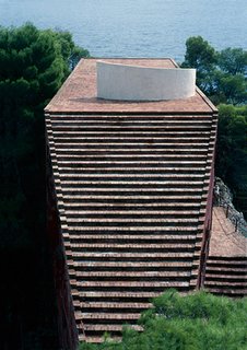 A wide staircase leads to the rooftop terrace.