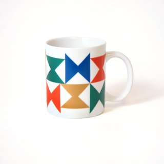 Inspired by the Miller House - Photo 1 of 5 - A boldly colored ceramic mug, with a pinwheel pattern for Georg Jensen tableware that was used at the Miller House.
