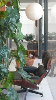 Eames Lounge Chair Porn - Photo 21 of 53 - Just as in the Eames house, at LACMA’s exhibition the couple’s Lounge Chair is placed against floor-to-ceiling glass window walls near the entrance.