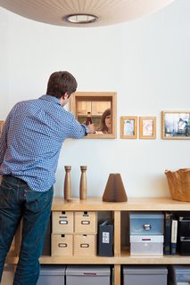 Peter lined the pass-through’s opening with plywood.