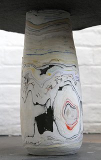 Recycled Paper Lights - Photo 3 of 3 - Wustenberg also crafts other shapes and objects, like this chubby table leg. The layers of revealed color resemble geologic forms.