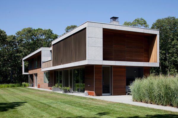 The 3,200-square-foot structure occupies a hillside site in Montauk, and enjoys a distant view of the ocean. Coen + Partners did the landscape design.