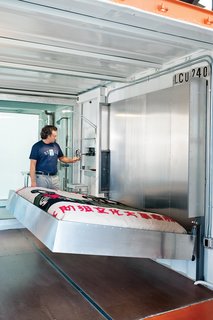 Furniture designer Pat Carson created a plethora of custom fixtures for the guest room, including a riveted aluminum Murphy bed.
