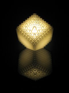Shine a LightBenshetrit’s table lamp, for the lighting and furniture company .MGX by Materialise uses QuaDror’s infinitely scalable geometry to create a honeycomb of 1,200 modules that fits over a metal base holding a 40-watt halogen bulb. The lamp, which arrives flat and expands, accordion-like, when lifted, is manufactured via selective laser sintering (SLS), a 3-D printing process that uses a laser to solidify layer upon layer of powdered resin particles. "When you buy the lamp, you get a disc with the file on it, so if it breaks, you can ‘reprint’ it," Benshetrit says.