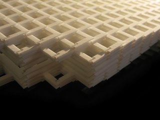 Close down the accordion-like Honeycomb lamp and you're left with a small stack of QuaDror connectors. Lift it up again and the cube comes back to life.