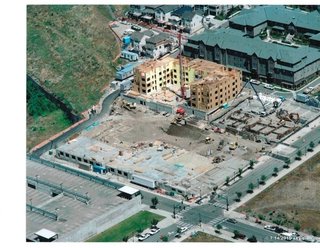 A Zero-Energy Community: Part 6 - Photo 4 of 6 - The site we negotiated with Port Blakely Communities. zHome is the community to the left of the photo with the concrete pumper and the larger podium and framed community is the YWCA Family Village.