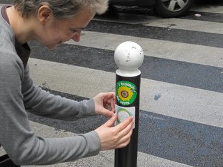 Building a Zero-Energy Community: Part 7 - Photo 3 of 6 - We also went guerrilla and the team recreated the logo to be an elemental sign—it just seemed to want that. We printed 10,000 stickers, some of which went worldwide. Here, one becomes part of Paris street art. If you’d like a sticker, email me at bradl@ci.issaquah.wa.us and I’ll set you up.