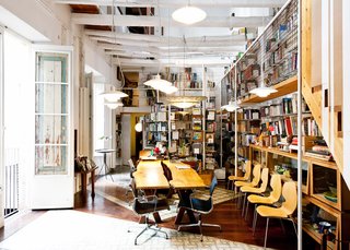 French doors line one wall that extends from the library to the first-floor sitting room and office.