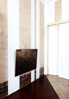 Strong lines on the floor and the walls reinforce the notion of old and new.