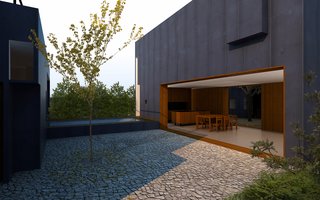 A computer rendering showing the dining room and living room looking onto a central courtyard. A raised swimming pool deck acts as a connecting form between two separate parts of the house. The master bedroom is shown on the left. The house features a steel exterior skin.