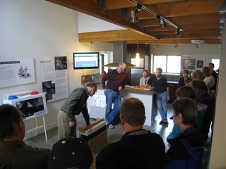 A Zero-Energy Community: Part 8 - Photo 3 of 7 - We had great support from our tour guides, who would provide in depth, one to two hour tours about the ins and outs of the project. Here, Mark Weirenga of David Vandervort Architects shows the wall section mock-up with the three inches of exterior expanded polystyrene.