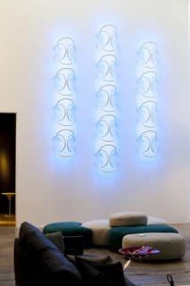 Flos Shop in San Francisco DZINE Showroom - Photo 1 of 9 - A corner of DZINE was given over to Flos's shop-in-a-shop, which included this installation of Gilad's Wallpiercings.