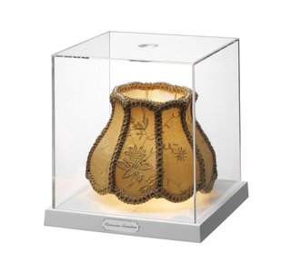 Flos Shop in San Francisco DZINE Showroom - Photo 8 of 9 - Like many of Gilad's designs this light combines wit and aesthetic, with the abstract and the functional. The fabric shade seemingly floats in an acrylic box, and is lit by a halogen lamp creating diffused light.