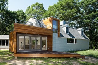 New McDonald - Photo 1 of 5 - Creative Direction<br><br>The arrowhead-shaped corner at the end of the living room evolved from the need to accommodate a standard sliding-glass-door module. "It would have been astronomically expensive to custom-build it," says Chris Bardt. This architectural gesture— the arrow "points" toward the river—"enabled us to be very generous with the view area without having to extend the entire house."