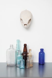 Not only do these colorful bottles make for humble accent pieces, they're also a reminder of the house's past: Whitlock discovered them while building the home, which stands on what was once a Chinese apothecary.
