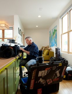 Whitlock hard at work with the tools of his other trade: sound mixing.