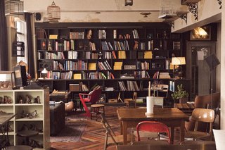 Kex Hostel, Reykjavik - Photo 3 of 9 - The back wall of the lobby is dedicated to a library and reading area.