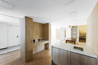 Modern Green Concept House in South Korea - Photo 6 of 10 - Tube StationNever enthralled with high-tech for its own sake, the architects make use of age-old passive cooling techniques like the stone "cool tube" that runs through the kitchen and second floor.