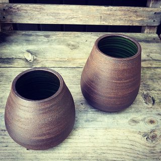 PUTIKMADE Pottery - Photo 3 of 4 - These rounder vases are from the UPO series. They can either sit on their own or hang suspended from a leather cord.