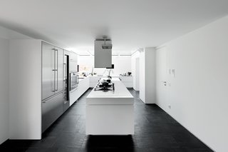 "We wanted a big kitchen to live in, not a small technical place to cook," says Guido Chiavelli, who returns from work every day to have lunch with his wife and son. At the far end, a glass ceiling presents an open-air feeling. "Cooking while it’s raining is fascinating," he says.