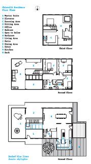 The floor plan shows three of the house’s four levels; the basement level contains a wine cellar and laundry room.