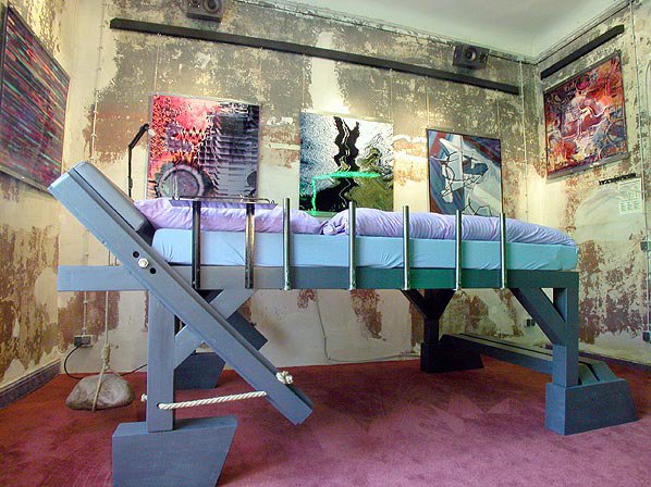 Propeller Island Hotel, Berlin - Photo 6 of 9 - With an in-room bathroom constructed out of old windows, occupants are meant to feel like they are in a writer’s enclave. The century-old skylight and walls are remnants from the pension hotel.