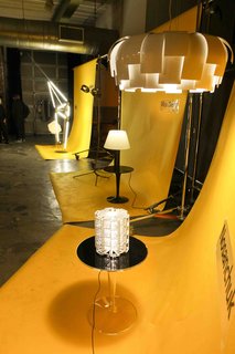 Dwell invited 14 designers to display work at the backdrop to the Light & Energy event. The set design was by Tom Borgese, who created photo vignettes in yellow for each design, unifying and warming the room at Industria SuperStudio.