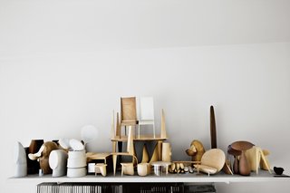 "Every material has its own beauty, but I’m mostly drawn to wood because of its variety of texture, smell, and color," Bakker says. Maquettes made of balsa wood and plaster are displayed in his studio and are used as guides for skilled Dutch or European artisans who produce the finished pieces in silver, glass, ceramic, and copper.