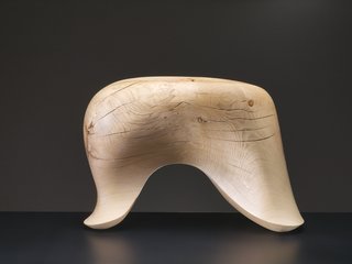 Tonus is a sculptural stool made in 2010 from a solid block of oak that continues to swell and shrink like a "living, breathing" creature.