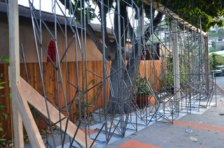 Each steel profile is placed vertically upright and 14 inches apart from each other.