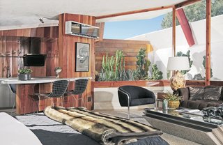 John Lautner's Desert Rose - Photo 5 of 5 - Tracy Beckmann and Ryan Trowbridge spent four years shopping for furnishings, fixtures, and lighting to outfit the guest rooms, sourcing steel hardware in Hong Kong, vintage lighting in Italy and France, and many mid-century pieces in their backyard, aka Palm Springs’s renowned vintage shops.