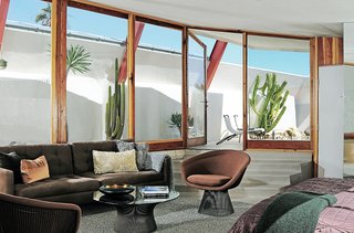 John Lautner's Desert Rose - Photo 1 of 5 - Finds included Bertoia barstools, a J. Wade Beam coffee table, and a chrome Thonet-inspired chair in Unit One and a Warren Platner coffee table and chair in Unit Four.