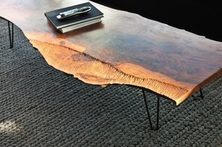 You Won't Be Calling This House a "Man Cave" - Photo 9 of 9 - The walnut coffee table in the living room is by Samuel Moyer.