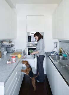 10 Best Modern Kitchens - Photo 6 of 10 - In this New York kitchen, every inch is used maximally, from the built-in double-decker Miele oven to the Sub-Zero fridge and freezer under the counter, distributed between four unobtrusive drawers.The Arclinea kitchen system includes an integrated lighting and power strip, which brightens the worktop and negates the need for jutting wall outlets. 